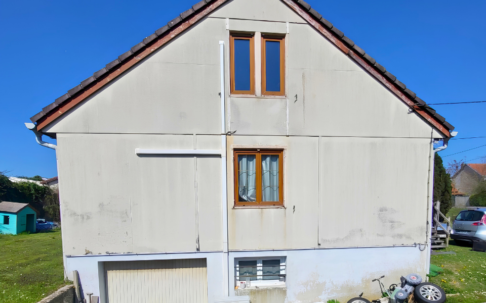 Isolation thermique par l’extérieur en fibre de bois d’une maison à ossature bois - avant