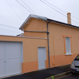 Rénovation en peinture d’une façade et d’un bardage en bois - après