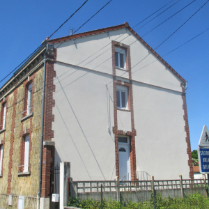 Rénovation d’un pignon avec un enduit minéral projeté - après